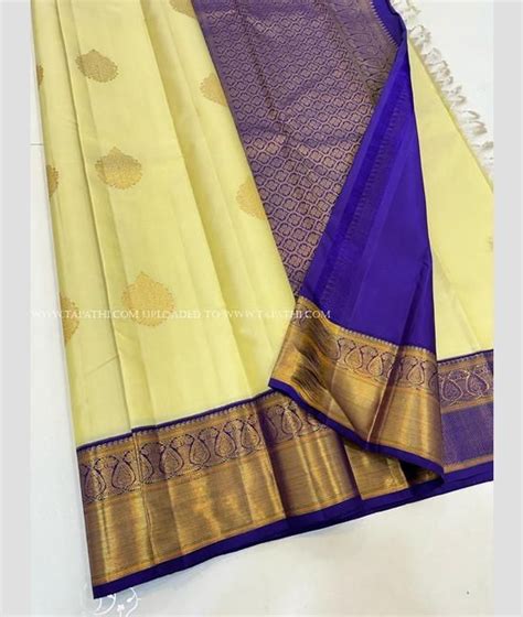 Cream And Purple Blue Color Kanchi Pattu Handloom Saree With All Over