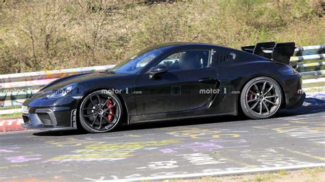 Porsche 718 Cayman GT4 RS Spied Testing Hard Among Other Hot Cars