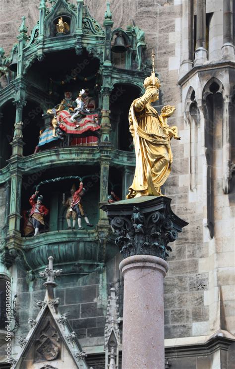 Golden Statue Of Holy Mary In The Main Square Of Munich In Germany