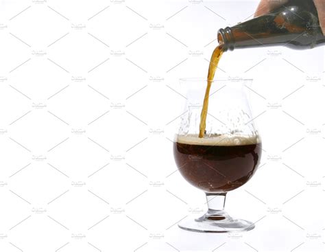 Pouring Dark Beer Into Glass Food Images ~ Creative Market