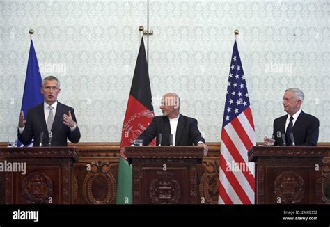 Nato Secretary General Jens Stoltenberg Left Speaks During A Press Conference With Afghan