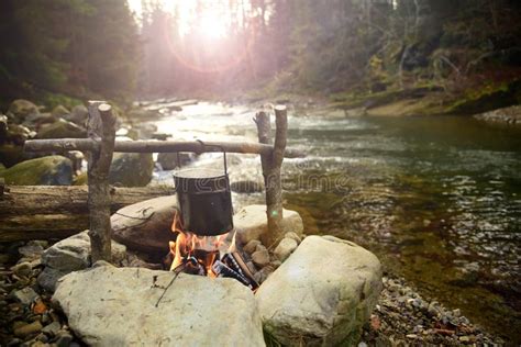 Cooking Food In Pot Over Campfire Outdoor Stock Image Image Of Camp