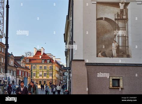 Wall Painting On Brick Building In Warsaw Old Town Poland Stock Photo