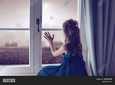 Woman Sad Looking Out Window