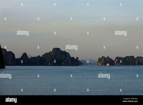 Sunset in the Ha Long Bay of Vietnam Stock Photo - Alamy