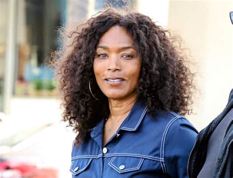 Angela Bassett Elevates Canadian Tuxedo With Chunky Sneakers In La