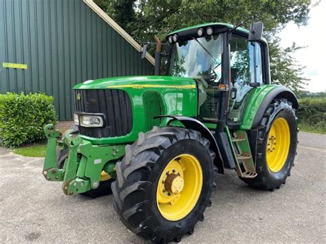 John Deere 6620 Premium Auto Quad Fronthef PTO RSL Handel