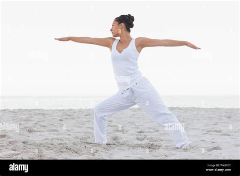 Pretty Brunette Woman Stretching Hi Res Stock Photography And Images Alamy