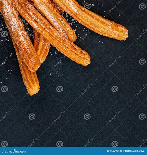 Churro On A Black Background Traditional Spanish Cusine Churros In A