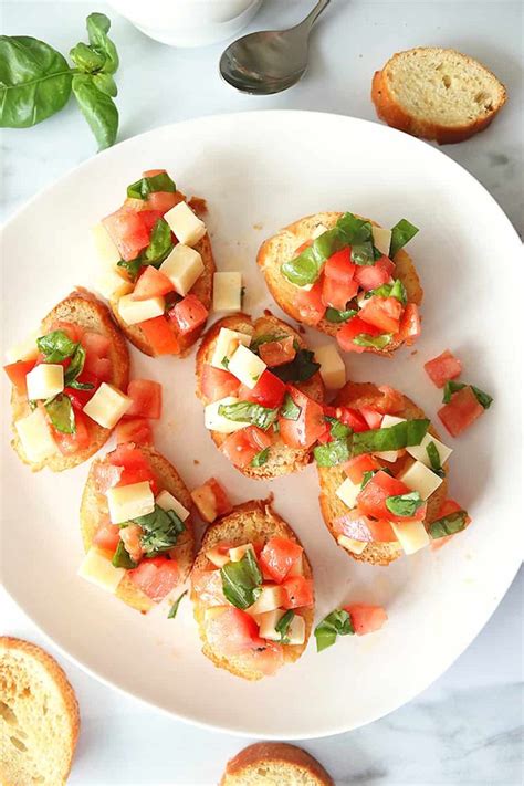 Bruschetta Recipe With Mozzarella Tomato And Basil With Drizzles Of