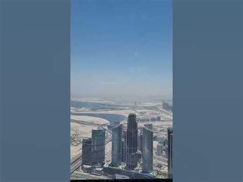 View on Dubai from Burj Khalifa. Вид на Дубай с башни Бурж Халифа ...