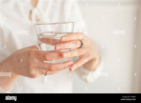 Female Hands Holding A Clear Glass Of Watera Glass Of Clean Mineral Water In Hands Healthy