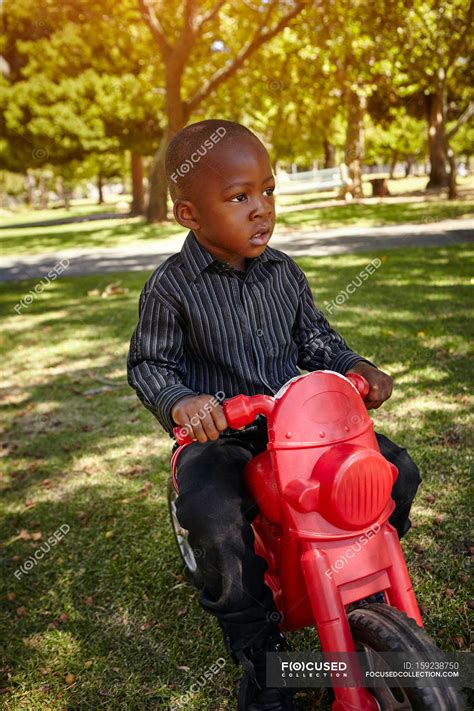 Boy Riding Motorcycle — Playing Focus On Foreground Stock Photo