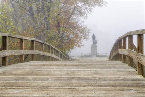 Old North Bridge And The Minute Man Statue Covered In Dense Fog And A