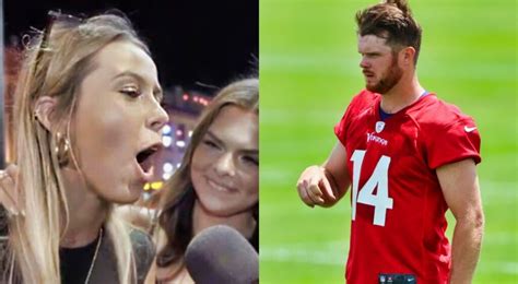 Qb Sam Darnold Of The Vikings Appears To Aim His Shot Toward The Girl