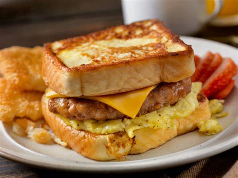 Ultimate French Toast Bun Breakfast Sandwich With Egg Bacon Cheese