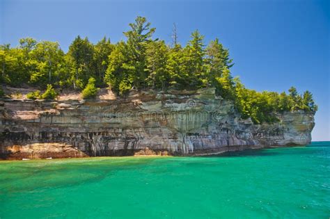 Rock arches and sea caves stock image. Image of blue - 20569235