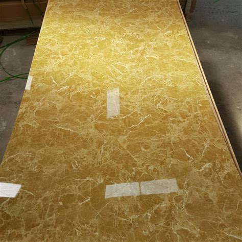 Jual Panel Dinding Pvc Motif Marmer Gold Emperador Kota Surabaya