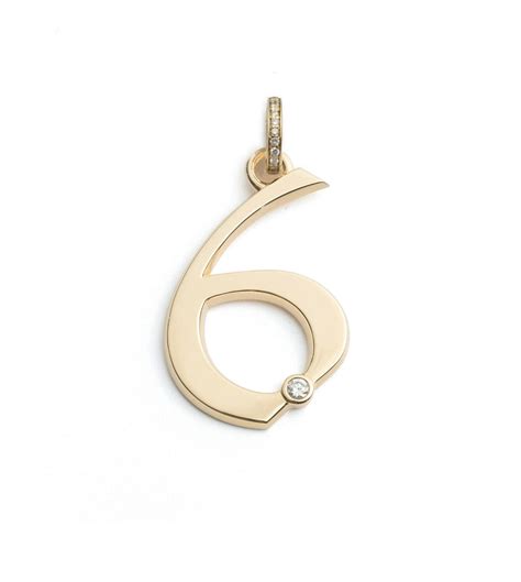 yellow gold number  engraved oversized medallion  diamond