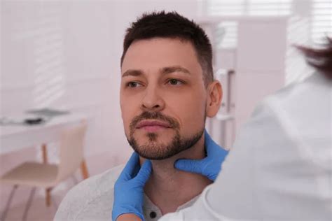 Doctor Examining Thyroid Gland Patient Hospital Stock Photo