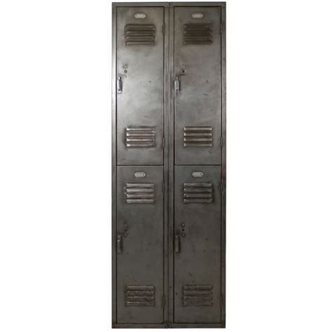 Two Metal Lockers Sitting Next To Each Other On A White Background With