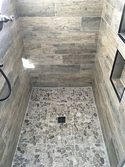 Wood Look Tile Shower With Natural Pebble Floor Superior Development