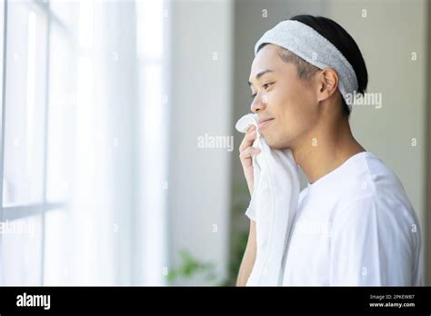 Man Wiping His Face Stock Photo Alamy