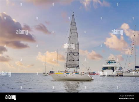 Yacht Sailing Against Sunset Holiday Lifestyle Landscape With Skyline