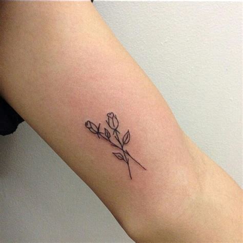 Two crossed roses tattoo - Tattoogrid.net