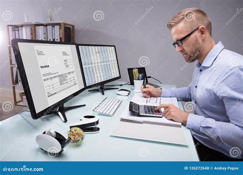 Side View Of A Businessman Calculating Invoice Stock Photo Image Of