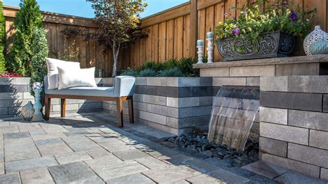 Unilock Lineo Wall Water Feature With Richcliff Courtstone Patio