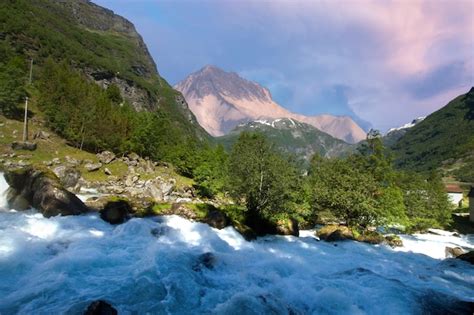 Premium Photo | Waterfall over the geiranger fjord