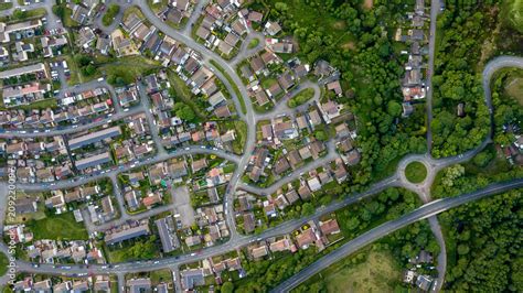 Top Down Aerial View Of An Urban Area In A Small Town Surrounded By