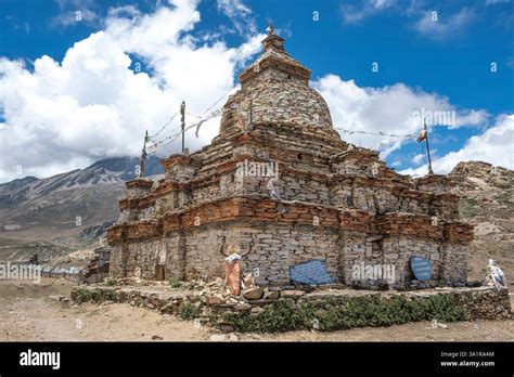 Sacred stones inscribed with mantras form a Mani wall near Nar, Nepal