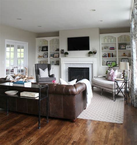 Dark Leather Sofa With Dark Wood Floors HomeDecorish