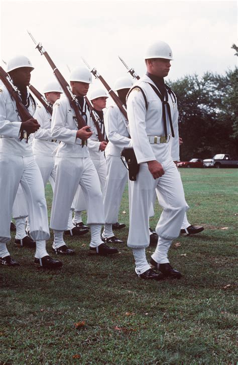 The Navy Drill Team Performs During The Commissioning Ceremony For The