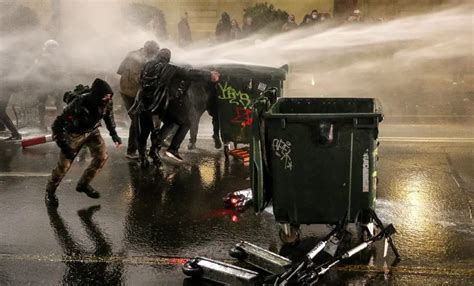 Georgian Police Using Water Cannons Stun Grenades To Disperse Protesters