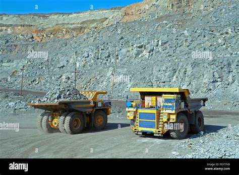 Two Big Trucks Transport Iron Ore In Career Stock Photo Alamy