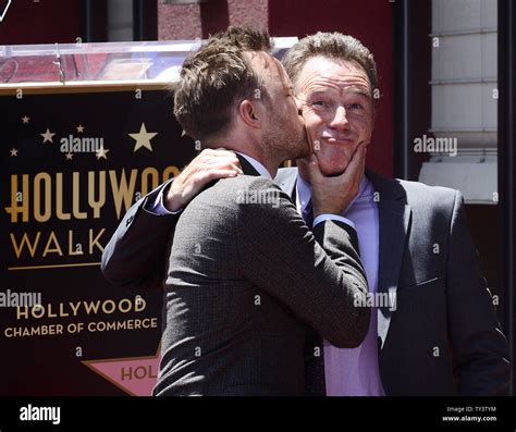 Bryan Cranston And Aaron Paul Kiss