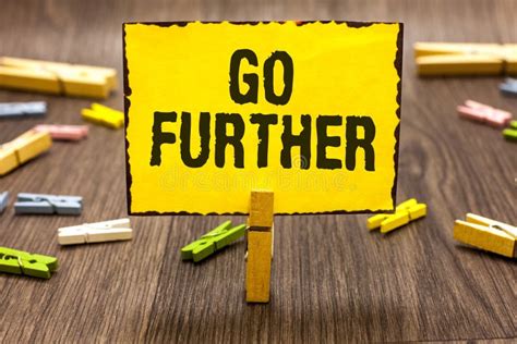 Text Sign Showing Go Further. Conceptual Photo To Move To a Greater ...
