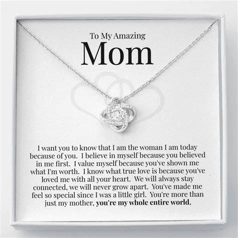 a necklace with the words to my amazing mom on it in a white gift box