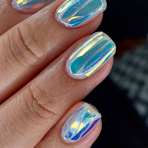 This New Manicure Trend Captures The Iridescent Shimmer Of Northern