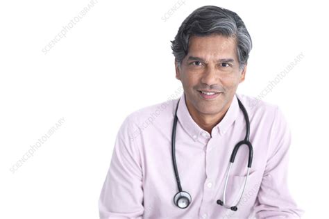 Smiling doctor - Stock Image - F039/6392 - Science Photo Library