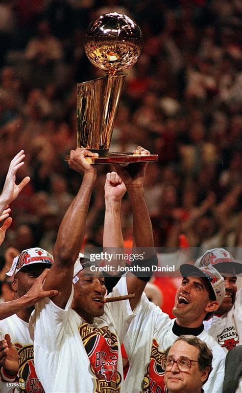 Chicago Bull Scottie Pippen Hoists The Nba Championship Trophy At End