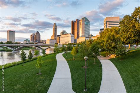 Skyline Of Columbus Ohio From Bicentennial Park Bridge At Night Stock