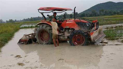 Amazing Tractor Kubota M6040 SU Is Working In Rice Field At Country