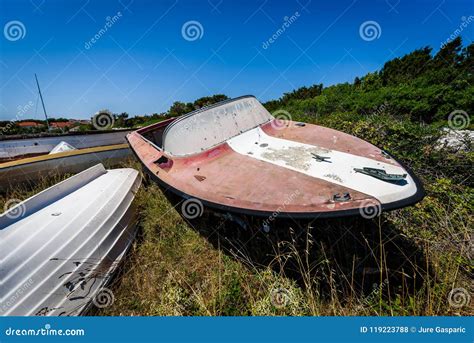 Old Abandoned Wrecked Speed Boat At Ship Or Boat Graveyard Stock Photo