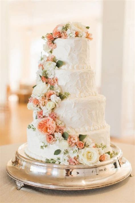 Four Tier Wedding Cake With Peach And White Cascading Flowers Get