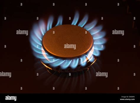 Blue Flame Of Lit Gas Burner Ring On Stove Range Top Stock Photo Alamy