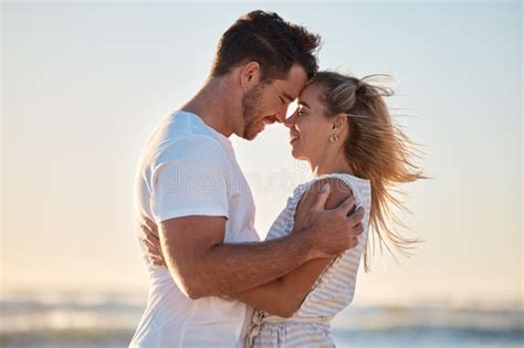 Love Happy Hug And Couple Relax At Beach With Happy Smile Affection